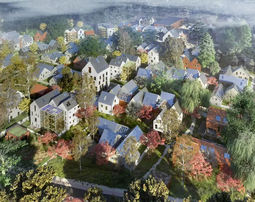 aerial view of a housing estate with lots of greenery and trees