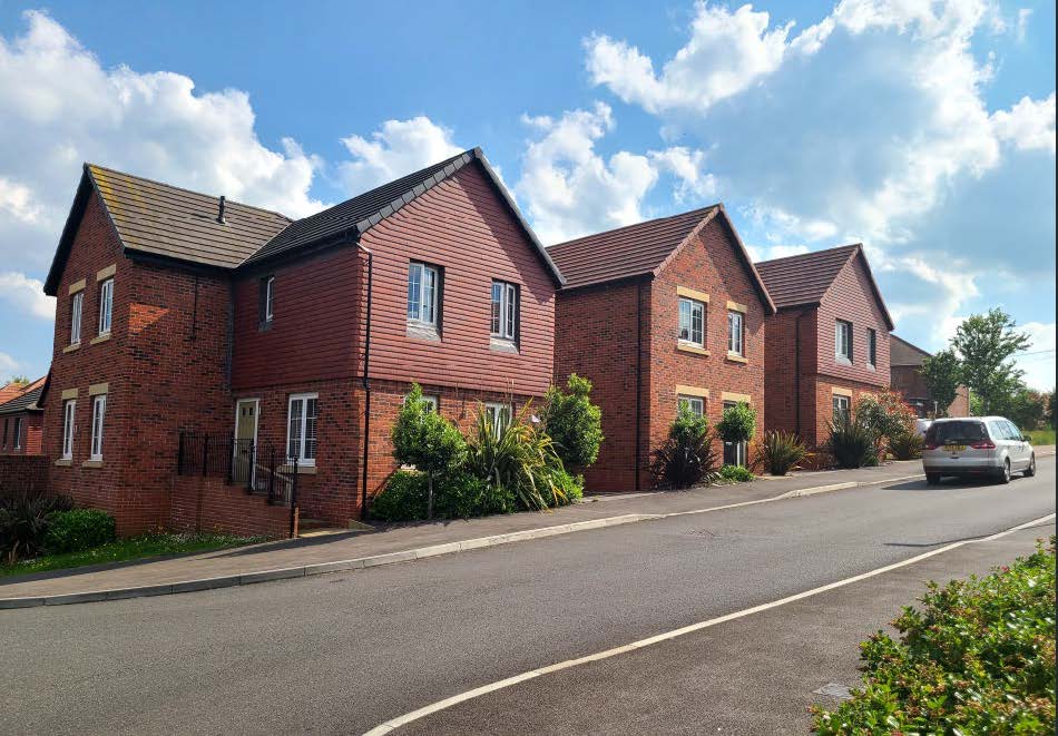 Housing development along a street.