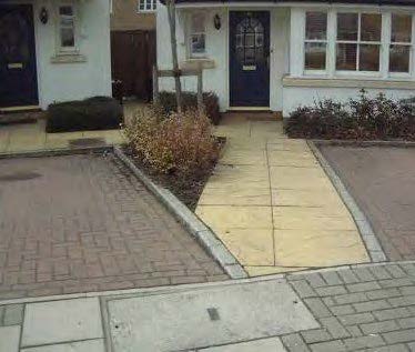 Paving leading up to 2 houses.