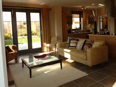 Living room with patio doors out to the garden