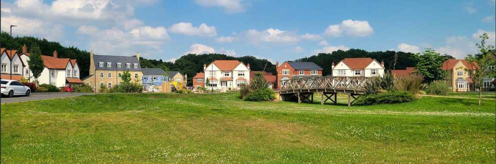 A large neighbourhood with a large green space in the centre.
